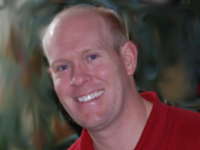 Dramm Hires Les Evans