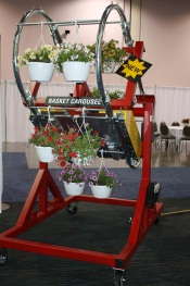 Mechanized Basket Elevator Makes Loading Conveyors Easier