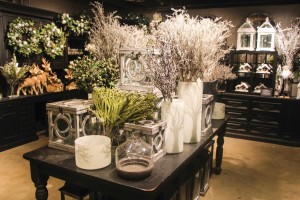 Each area of the floral department silently suggests which colors and stems look good together.