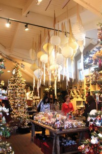 Ceiling merchandising like these folded-paper sculptures complete the look.