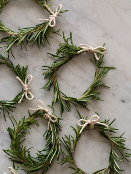 Mini rosemary wreaths can be attached to gifts, draped on wine bottles or used in table settings.