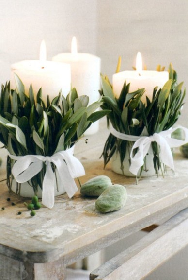 Wrap candles with leaves. 