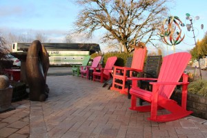 Adirondack chairs line the entry walkway