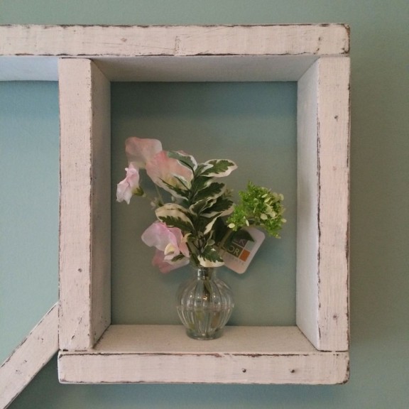 Small floral arrangement in the "love" sign in the girls' bedroom.