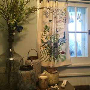 A tea towel used as a curtain.