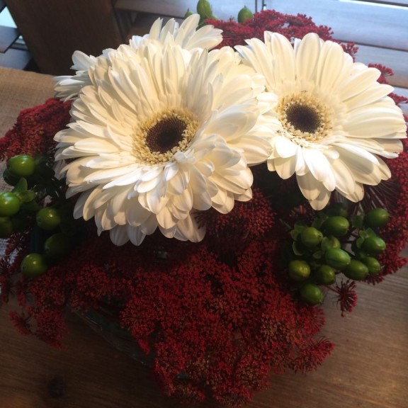 Bachman's, which has a floral department, includes floral arrangement throughout the Idea House.