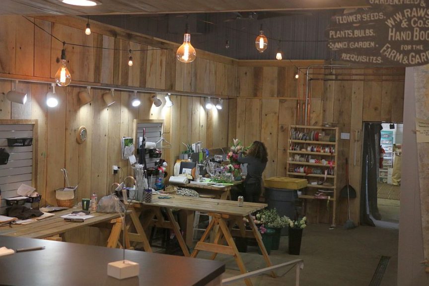 AFTER: The florist work area is visible to shoppers 