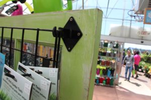 Close up of how the wire rack is attached to a door at Cornell Farms