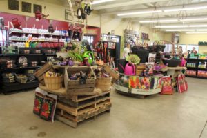 Roughly stacked pallets act as a table at Gardener's Choice